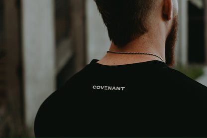 Silicone "Covenant" on the back neckline of the Brushed Black Covenant Sport Tee. 