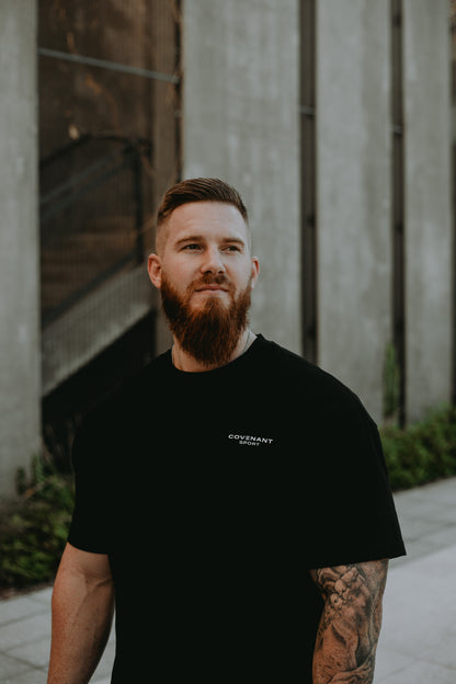 Brushed Black Minimalist Essentials Tee with "Covenant Sport" logo on the front left breast. 